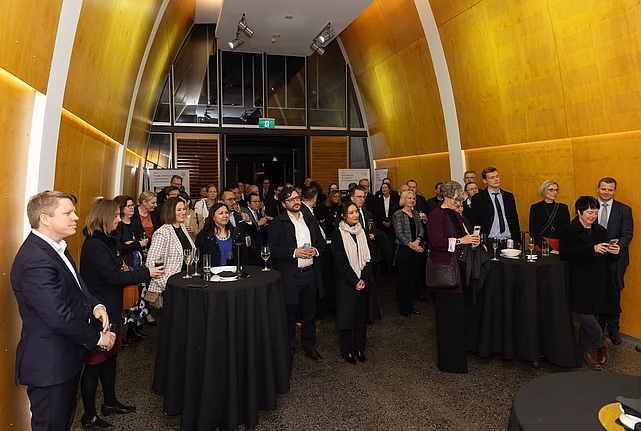 Guests watch the opening of the new FES office for Australia and New Zealand