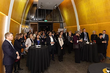 Guests watch the opening of the new FES office for Australia and New Zealand