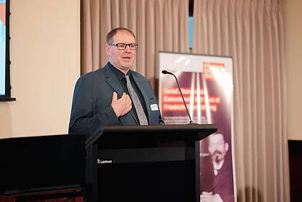 Jürgen Coße MdB addressing the participants of Democracy Reimagined